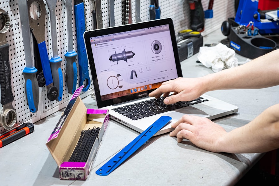 Dyno operator monitoring gauges and laptop during a tuning session