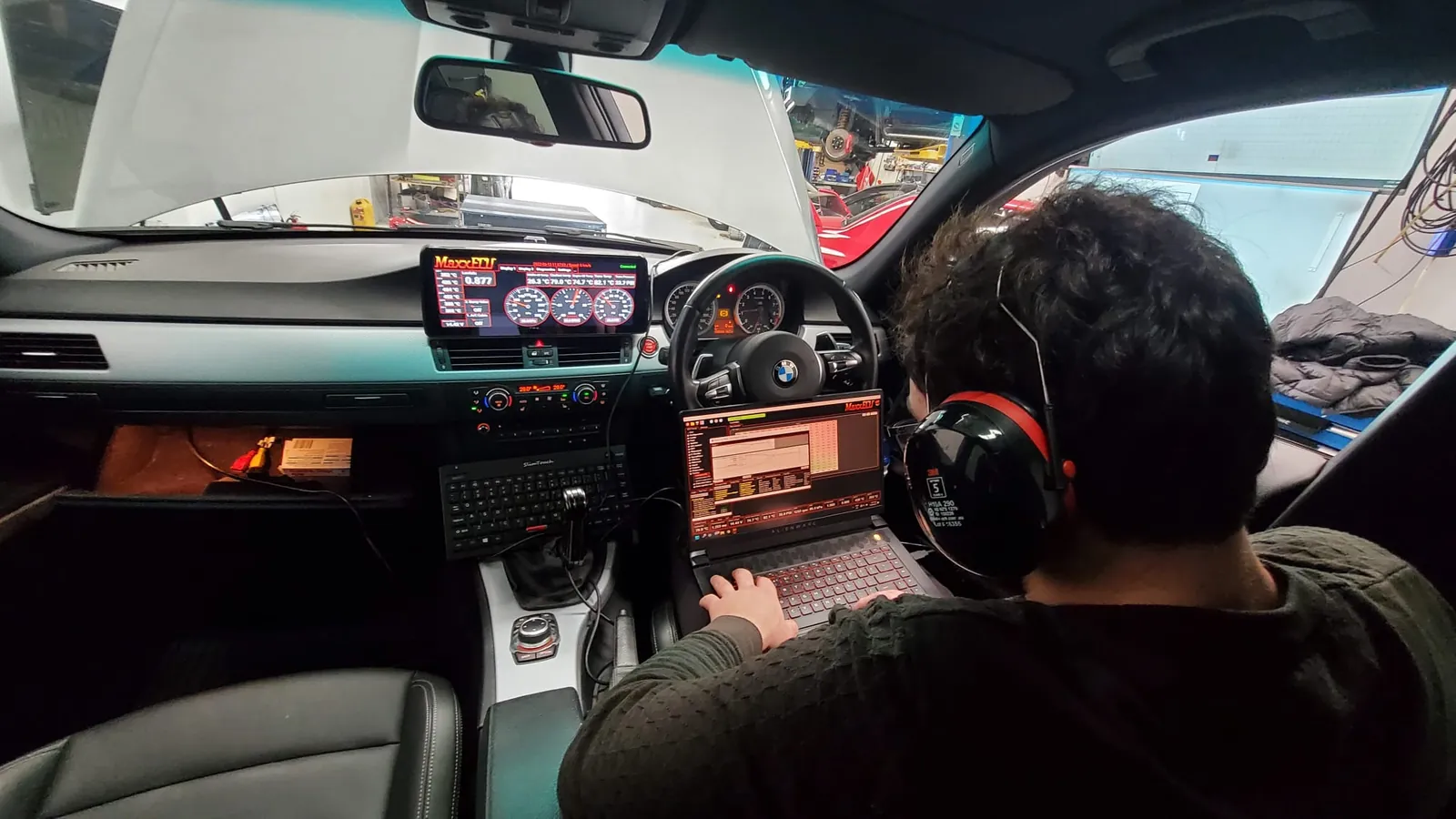 Tuner calibrating at a laptop